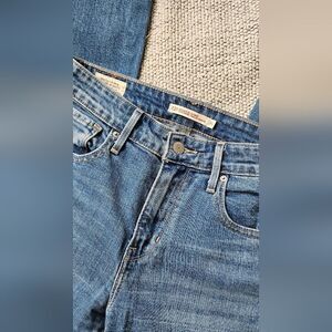 Levis high rise distressed jeans